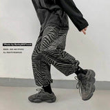 Jinquedai Full print zebra pattern casual pants men's spring and autumn new style Korean loose nine-point pants casual hip hop trousers jinquedai