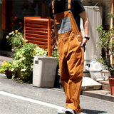 Jinquedai Men's Fashion Streetwear Denim Overalls Men Relaxed Fit Overalls Workwear With Adjustable Straps And Convenient Tool Pockets jinquedai