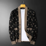 Jinquedai Autumn contrasting color patchwork jacquard knitted cardigan men's new trend brand sweater coat casual and handsome shawl jinquedai