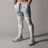 Jinquedai  Slim-fit cotton fitness men's sports pants streetwear casual trousers color matching zipper feet men's trousers jinquedai