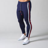 Muscle fitness men's sports pants men's trousers outdoor fitness exercise training feet Slim streetwear casual pants jinquedai