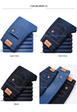 Jinquedai  autumn spring fitted straight stretch denim jeans classic style badge youth men's business casual jeans trousers jinquedai