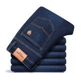 Jinquedai  autumn spring fitted straight stretch denim jeans classic style badge youth men's business casual jeans trousers jinquedai